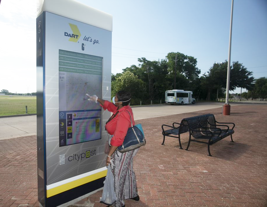 Customer tries out a DART interactive kiosk