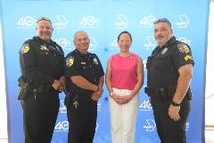 Nadine Lee and Charles Cato with Police Staff