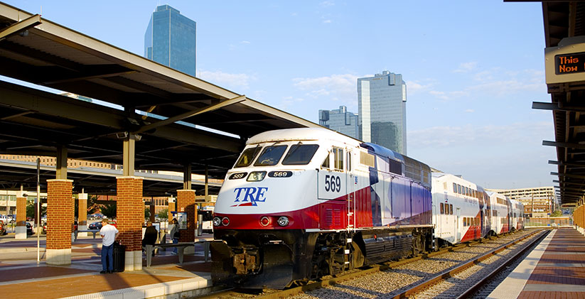 A Trinity Railway Express commuter train sits parked at Fort Worth Central Station in Fort Worth, Texas.